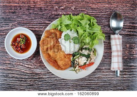 Rice Topped Stir - Fried Spicy Basil With Crad And Minced-pork Omelet.