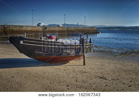 HDR photo of a fishing boat on the beach