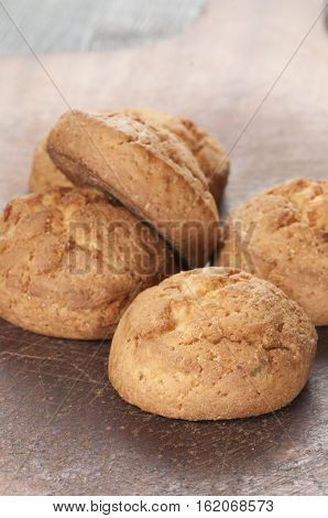Cakes with succade oa timber board close up