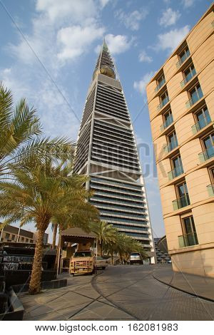 RIYADH - AUGUST 22: Sunset light at Al Faisaliah tower facade on August 22, 2016 in Riyadh, Saudi Arabia. Al Faisaliah towers is a luxury hotel and the most distinctive skyscraper in Saudi Arabia