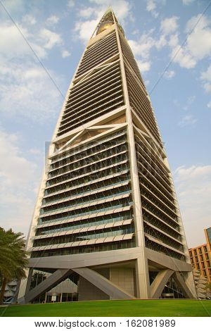 RIYADH - AUGUST 22: Sunset light at Al Faisaliah tower facade on August 22, 2016 in Riyadh, Saudi Arabia. Al Faisaliah towers is a luxury hotel and the most distinctive skyscraper in Saudi Arabia