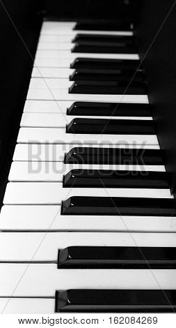 Piano keys,  musical instrument,  piano keys on black background,  black and white
