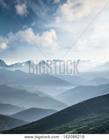 Hills during sunrise in mountain valley. Beautisul natural landscape