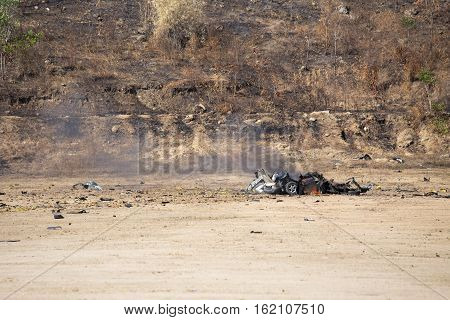 wrecked car fire car parts blown away from explosion in post blast investigation course training in academy