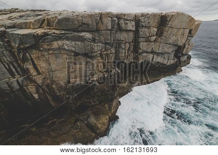 Torndirrup National Park Natural Bridge in The Great Southern - Albany Western Australia. vintage toning filter add .