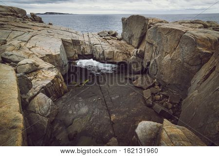 Torndirrup National Park Natural Bridge in The Great Southern - Albany Western Australia. vintage toning filter add .