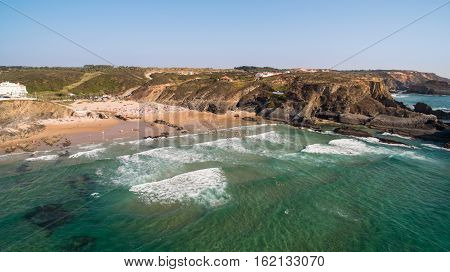 People rest on the beach naer Zambujeira de Mar, Portugal