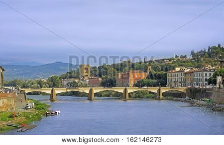 The Ponte alla Carraia Bridge is a five-arched bridge spanning the River Arno and linking the district of Oltrarno to the rest of the city of Florence Italy.