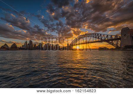 Sydney Harbour at sunset viewed from Milsons Point in North Sydney Australia. DEC 19,2016 Sydney Harbour is a beautiful meandering waterway, famous around the world.