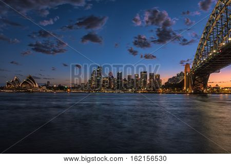 Sydney Harbour at sunset viewed from Milsons Point in North Sydney Australia. DEC 19,2016 Sydney Harbour is a beautiful meandering waterway, famous around the world.