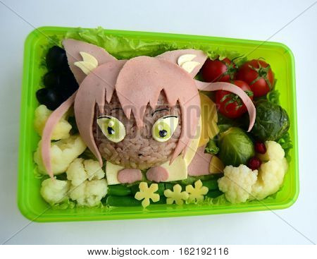 The girl a cat is made of rice. Creative food for good mood and appetite. Kyaraben, bento