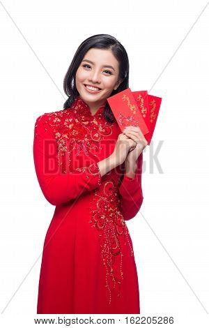 Portrait Of A Beautiful Asian Woman On Traditional Festival Costume Ao Dai Holding Red Pocket - Luck