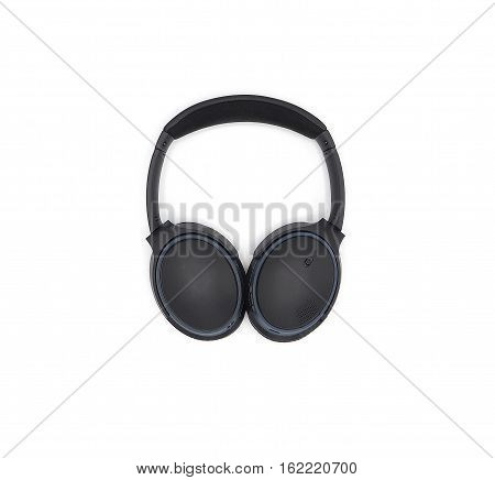 Black wireless headphone around ears and white background.