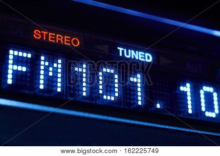 FM tuner radio display. Stereo digital frequency station tuned. Horizontal