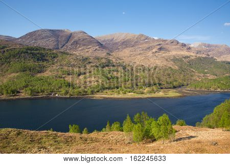 Beautiful Scottish Loch Leven Scotland UK in spring with mountains sunshine and blue sky