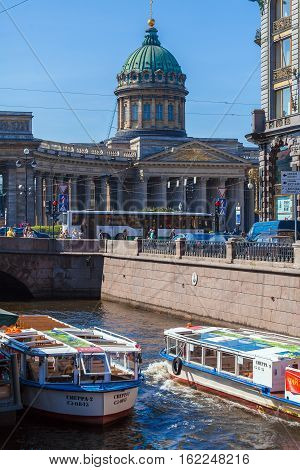 Saint Petersburg, Russia - July 26, 2014:  Tour Boats On The Moika River And The Kazan Cathedral