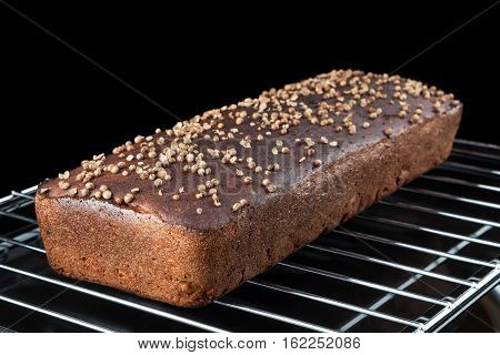 Freshly baked Borodinsky bread. Traditional Russian rye-wheat bread with coriander malt and molasses