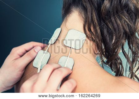 TENS Treatment In Physical Therapy, toned horizontal image