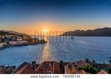 Aerial evening panoramic view at cityscape of Korcula town with marble seascape in background, Croatia Europe..