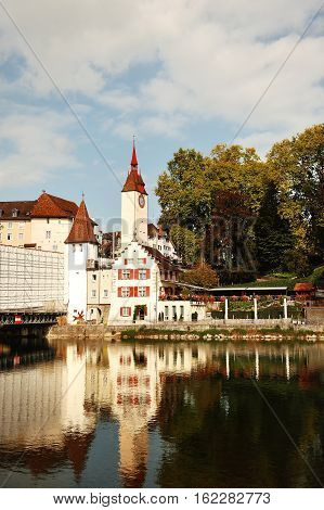 Swiss characteristic buildings and Reuss river in Bremgarten near Zurich canton Aargau