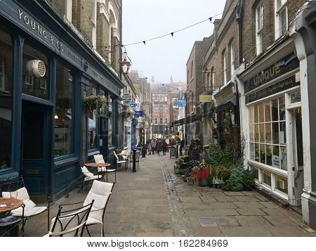 HAMPSTEAD, LONDON - DECEMBER 17: The urban village atmosphere amongst the Pubs and Shops along Flask Walk on December 17, 2016 in Hampstead, London, UK.