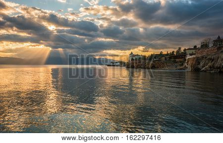 Urban Landscape With Clouds And Reflections  In Loutra Edipsou, Evia