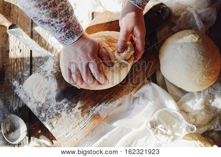 Close Up View Of Baker Kneading Dough. Homemade Bread. Hands Pre
