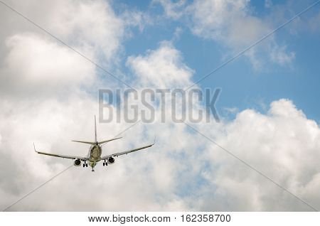 Airplane Approaching The Airport And Landing In Miami