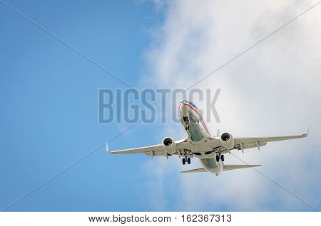 Airplane Approaching The Airport And Landing In Miami