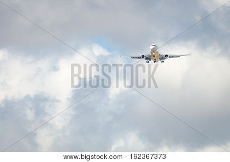 Airplane Approaching The Airport And Landing In Miami