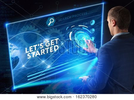 Business, Technology, Internet And Network Concept. Business Man Working On The Tablet Of The Future