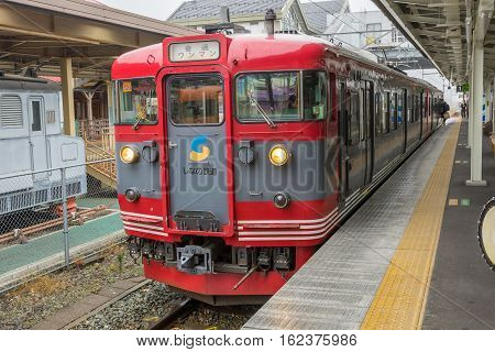 TOKYO, JAPAN - 20 NOV 2016 : Train stopped at Karuizawa Railway station.The railway system is one of the most important public transportation in Japan.