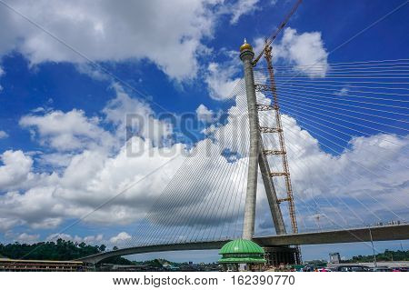 Muara,Brunei-Nov 12,2016:Construction of the Sungai Brunei Bridge across the Brunei River bisecting Bandar Seri Begawan,Brunei's capital city on 12th Nov 2016 in Brunei Darussalam.