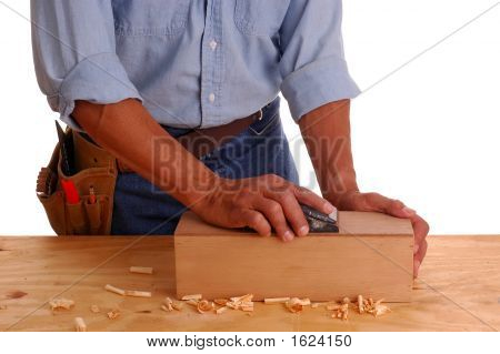 Carpenter Holding Herrscher und Bleistift