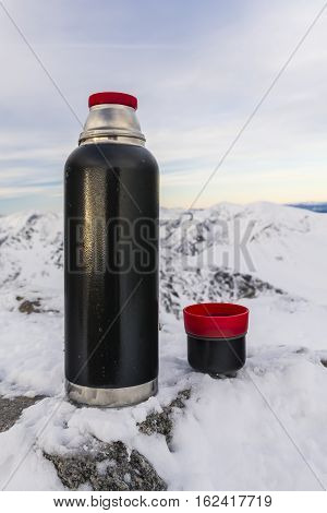 Cup Of Tea And A Thermos.