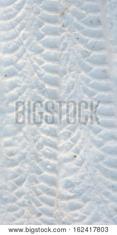 tire tracks in the white snow, texture, background