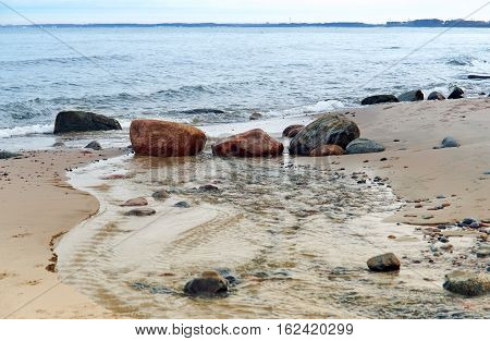 sea wave coast of the Baltic sea blue sea waves beat on the rocks