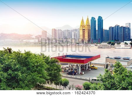 andscape of downtown near water of chongqing in blue sky