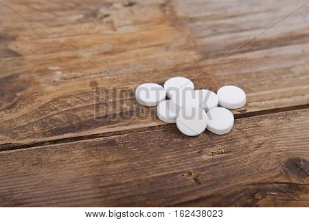 Traditional Dutch white candy Pepermunt on wooden background