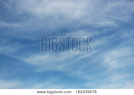 Fantastic soft white clouds against blue sky background