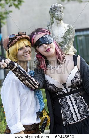 CAGLIARI, ITALY - May 29, 2016: Sunday at La Grande Jatte VIII Ed. At the Public Gardens - Sardinia - portrait of beautiful girls in costumes steampunk