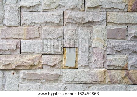 Abstract weathered seamless texture stained old stucco light gray and aged paint white brick wall background in rural room grungy rusty blocks of stonework technology. High resolution white brick