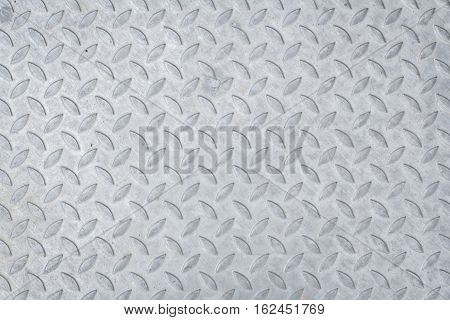 pattern style of steel floor for background . Seamless steel diamond plate texture