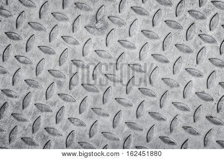 pattern style of steel floor for background . Seamless steel diamond plate texture