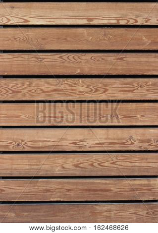 Horizontal wooden slats. Smooth polished wood texture.