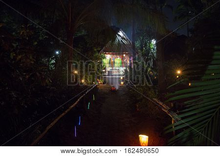 Illustrative image. Pondicherry, Tamil Nadu, India - Marsh 10, 2014. Village and city by night in India area. Life during the night.