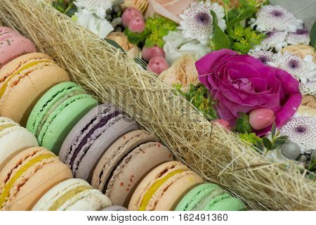 sweets with fruit filling French cake a delicious dessert flowers roses and chrysanthemums gift