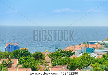 Colored Buildings Of Willemstad Downtown With Facades In Curacao