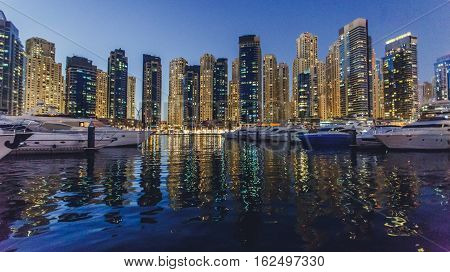Sea Emirates in night Dubai.  Marine Dubai port boat.