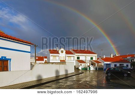 Vila Nova de Milfontes, Portugal, November 24, 2016: A rainbow over Vila Nova de Milfontes in Portugal.